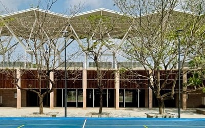 Aidia Studio lofts lightweight metal roof over Mexican grandstand