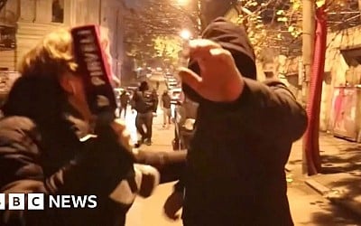 Moment Georgian press attacked by masked men