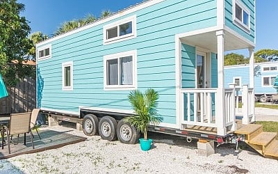 This Vibrant Baby Blue Tiny Home Will Have You Missing Summer This Winter Season