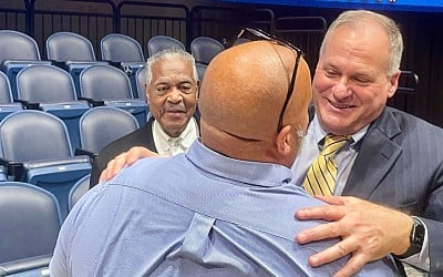 Back at WVU, Rodriguez laments leaving for UM