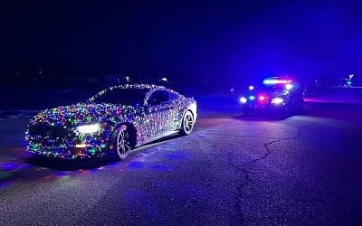 Driver stopped in Wyoming for covering car in Christmas lights