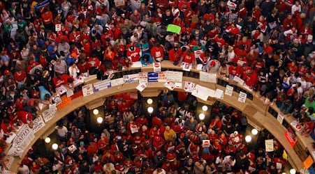 Unions score a major win in Wisconsin with a court ruling restoring collective bargaining rights