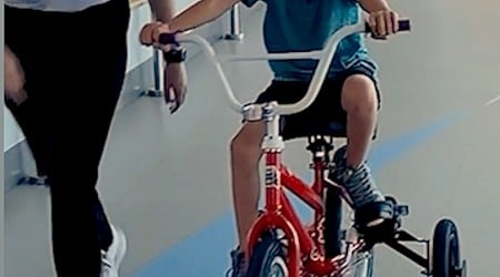 WATCH: 7-year-old with rare genetic condition rides bike for 1st time