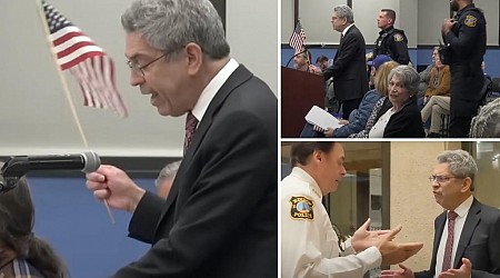 NJ lawyer thrown out of town council meeting for waving American flag to protest new ban