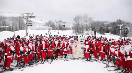 Over 300 skiing Santas raise $9,000 for charity in Maine