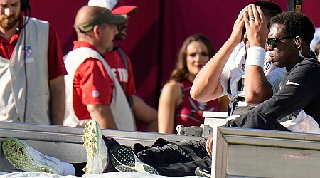 Raiders QB O'Connell carted off with knee injury