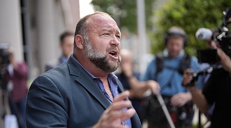 The fight for Alex Jones' Infowars company heats up as Jones sues to hold on