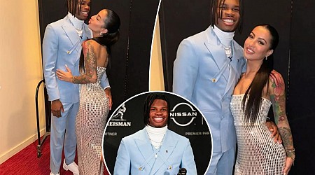 Travis Hunter, fiancée Leanna Lenee get cozy during Heisman Trophy win