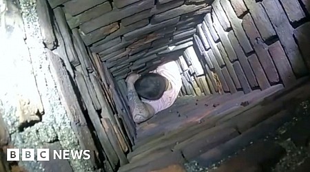 Watch: Man trying to escape police gets stuck in chimney