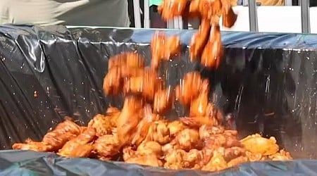 Barbecue company cooks up 655 pounds of chicken wings