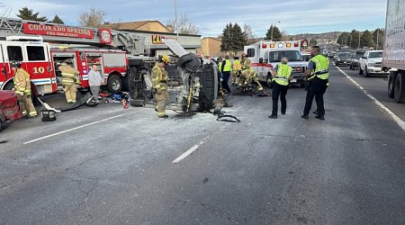 Car flips, catches on fire at North Academy and North Carefree