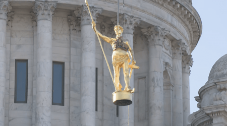 Independent Man statue returned to Rhode Island State House dome