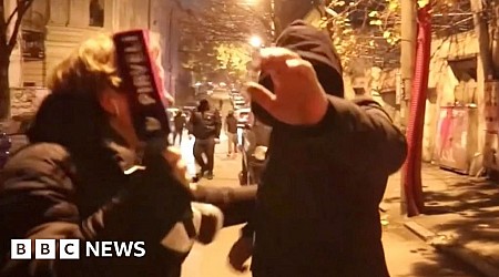 Moment Georgian press attacked by masked men