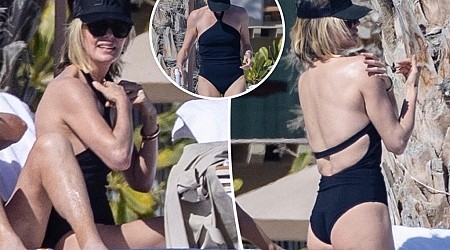 Charlize Theron soaks up the sun in a black swimsuit on Mexico vacation