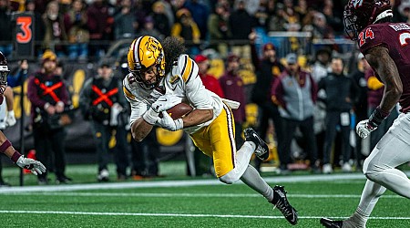 Dutch Fork product Elijah Spencer helps Minnesota defeat Virginai Tech to win the Duke's Mayo Bowl in Charlotte