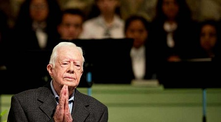 Jimmy Carter's 6-day state funeral begins with a motorcade through south Georgia