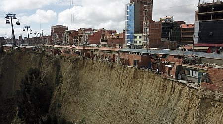 Shamans refuse to evacuate precarious cliff-top shacks in Bolivia despite government order