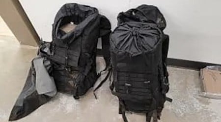 Backpacks containing $1.1 million of cocaine discovered in the wilderness near Canada