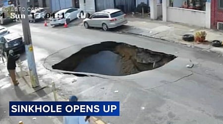 Part of road collapses into sinkhole moments after bus passes by in Philadelphia | VIDEO