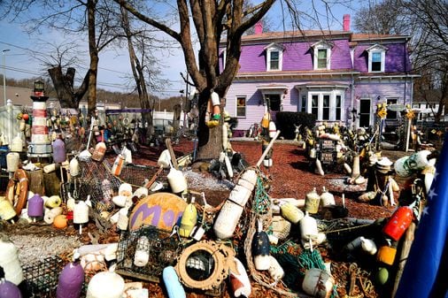 This purple Victorian house in R.I. with buoys out front is actually an animal rescue