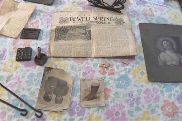 Nearly 110-year-old time capsule found in ceiling at Michigan home