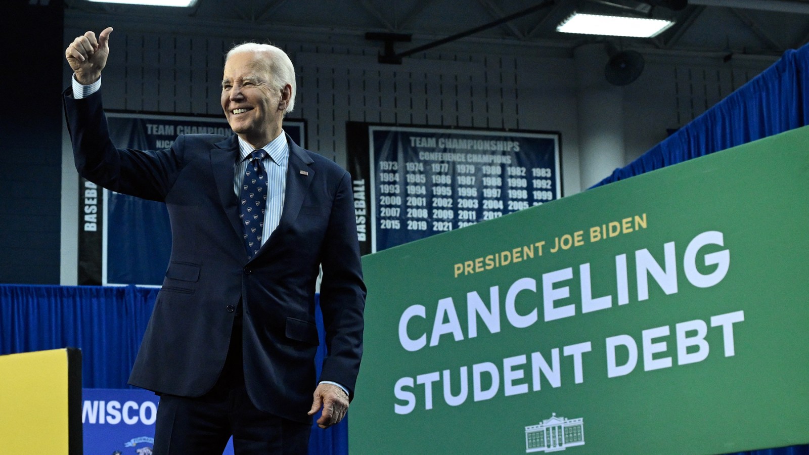 Biden Just Forgave $7.4 Billion In Student Debt — Are You Eligible?