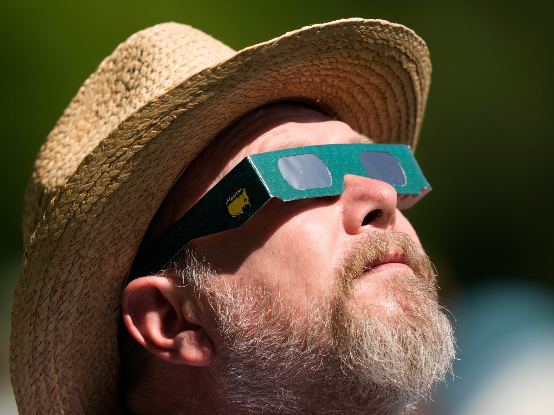 Residents in North America look to the sky for a rare total solar eclipse