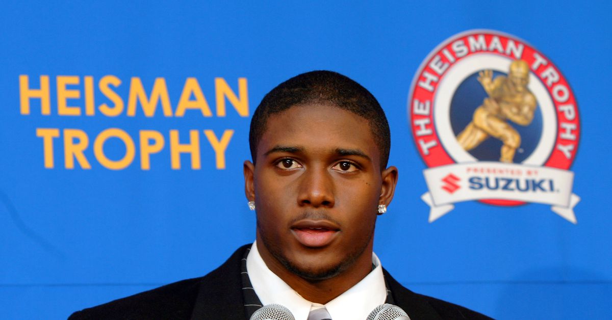 Why Reggie Bush lost his Heisman Trophy, and why he is getting it back now