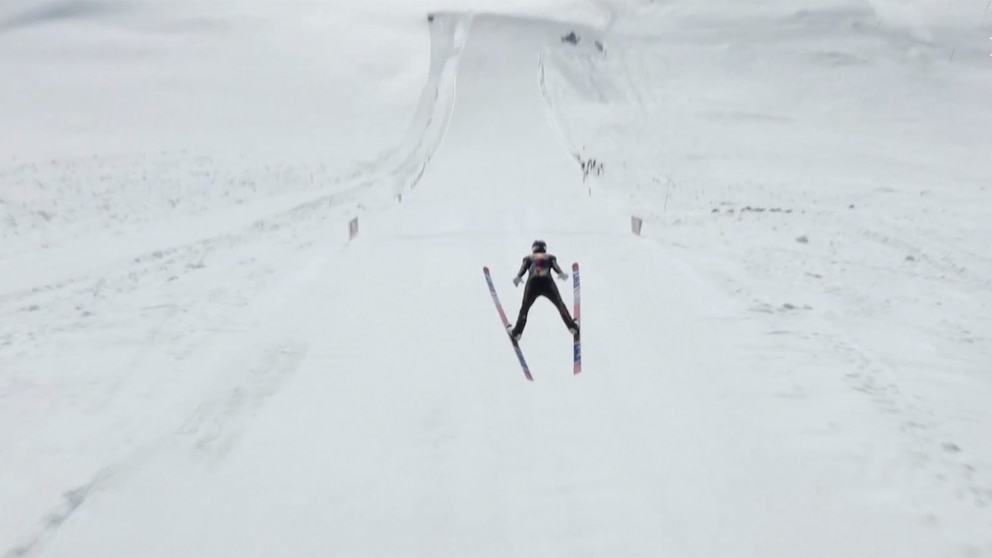 WATCH: Olympic champion soars to new ski jump record