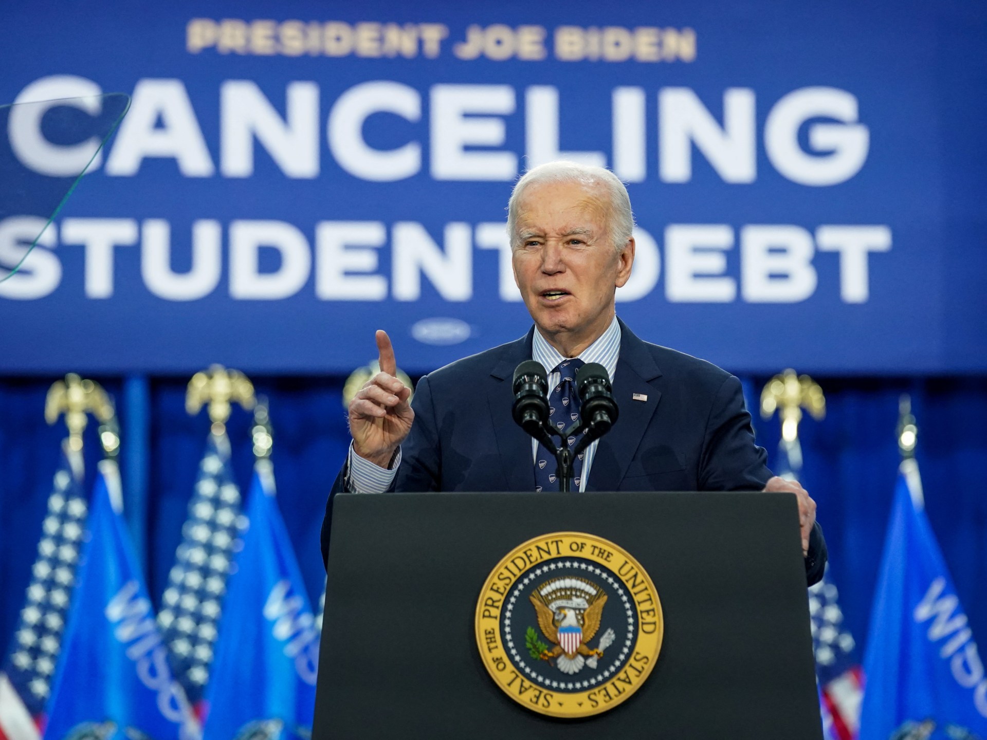 Biden unveils new plans to ease US student loan debt for millions