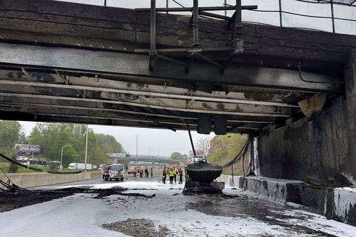 Workers removing bridge; highway still closed