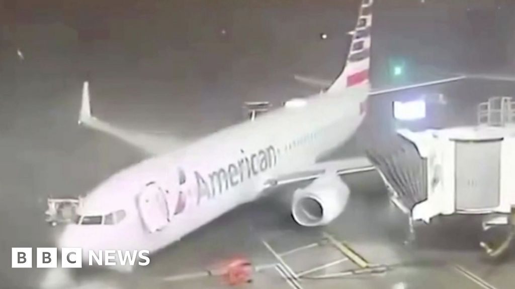 Moment winds push plane away from gate in Texas