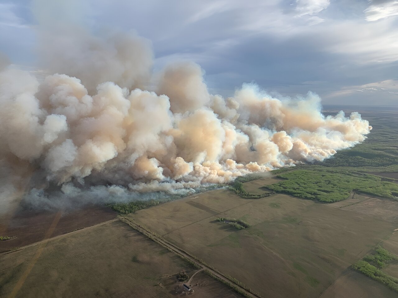 More evacuated as early wildfires sweep western Canada