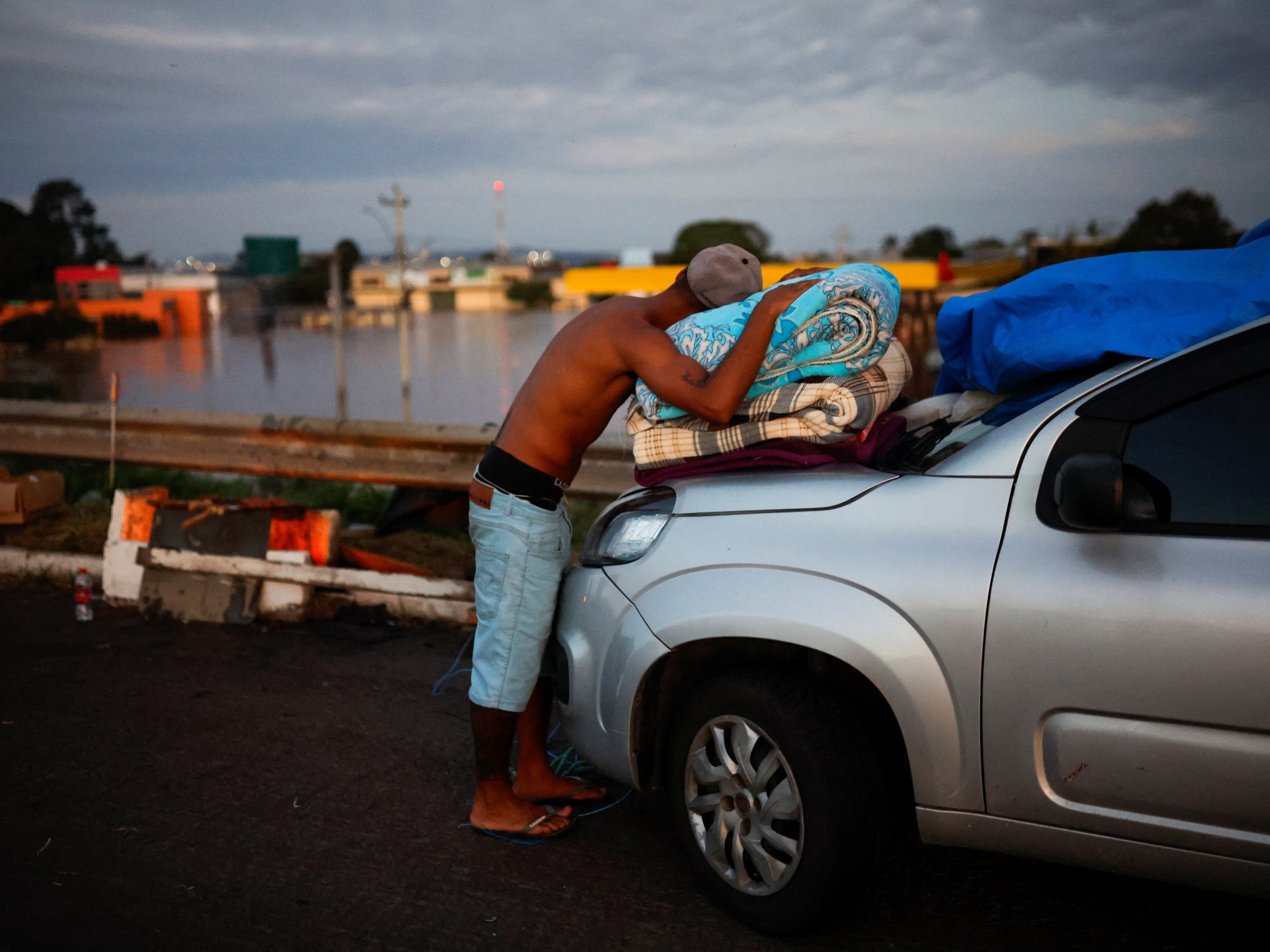 ‘Desperate’ rescues under way as Brazil floods kill 90, displace thousands