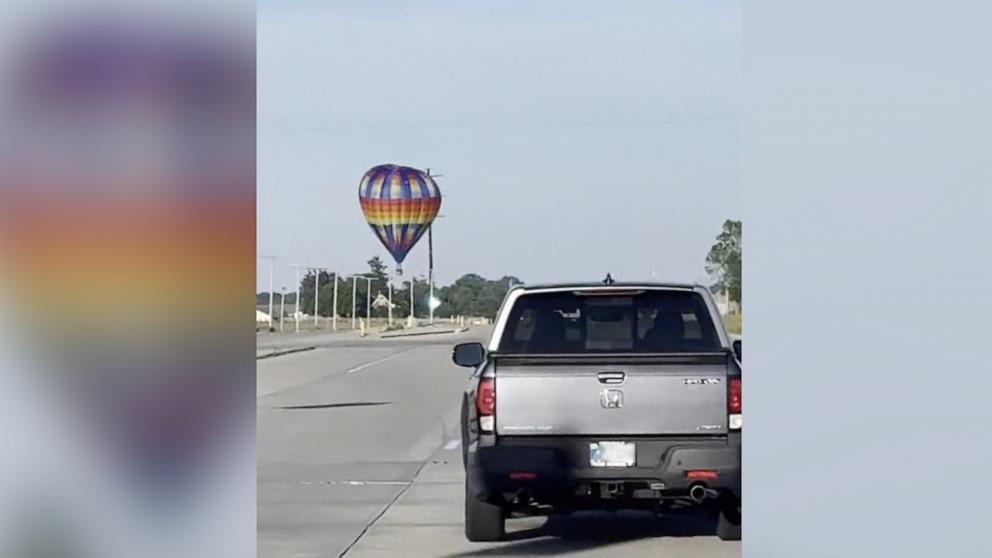 Hot air balloon strikes power lines, catches fire; 3 injured: FAA