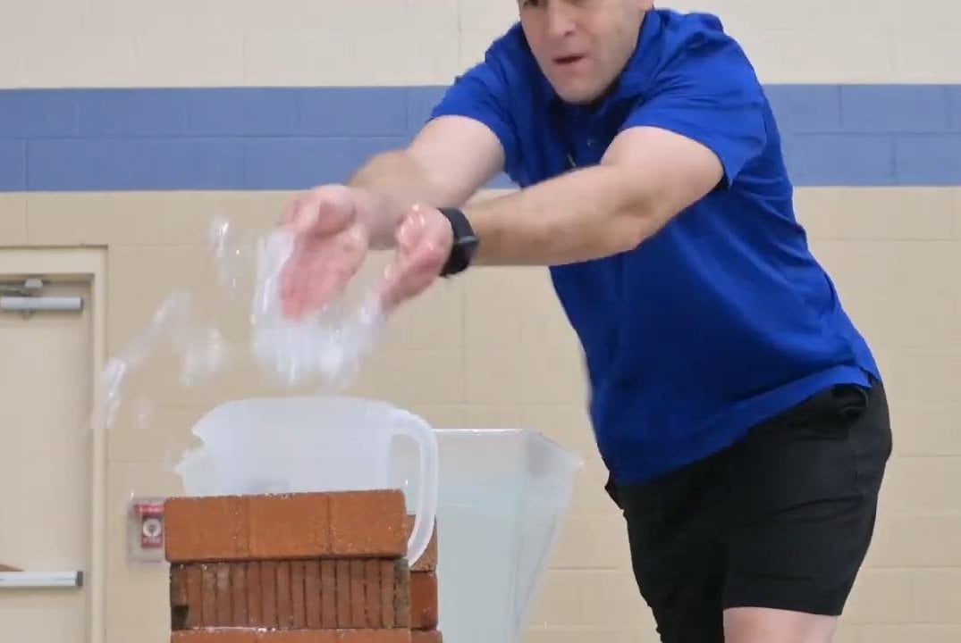 Idaho man moves water by hand for Guinness World Record