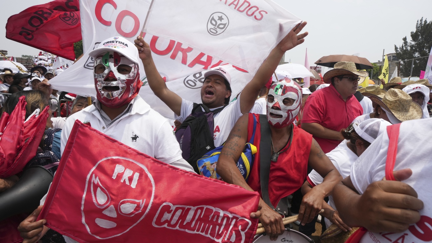 Violence clouds the last day of campaigning before Sunday's elections in Mexico