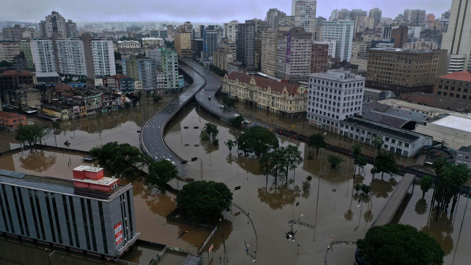 Deadly Floods Kill Hundreds Across The Globe: Here’s Where The Devastation Is Happening (Photos)