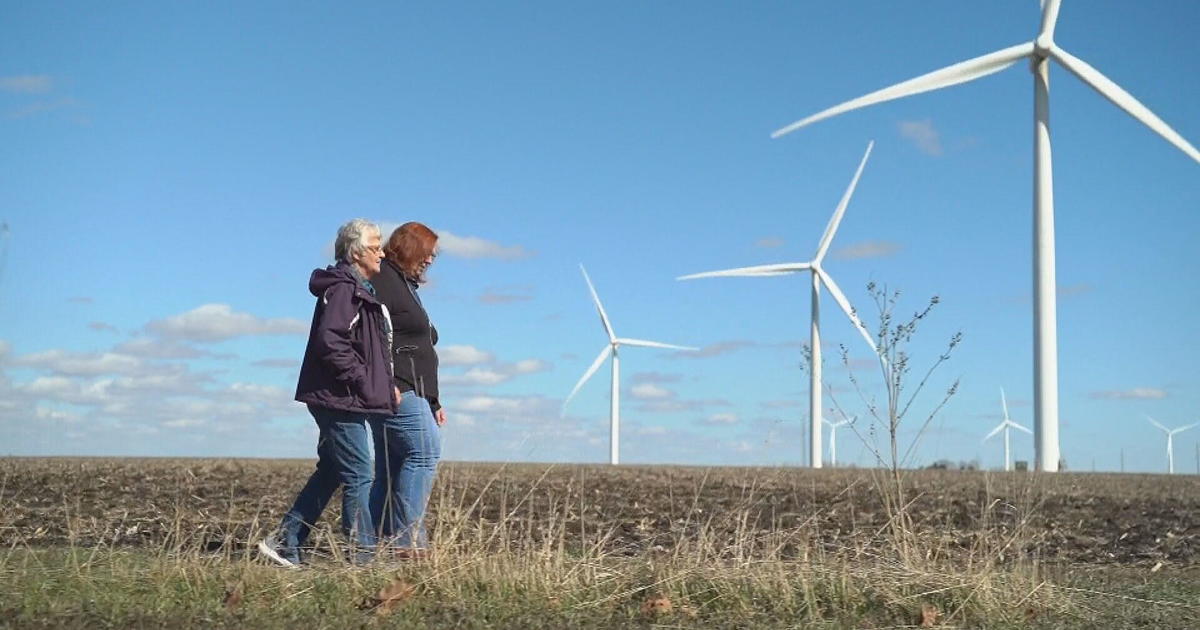 An Iowa farmer had $350,000 in debt. Wind turbines are helping her get out.