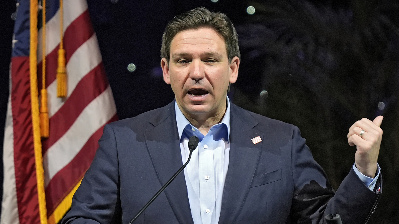 Florida Gov. Ron DeSantis signs a bill that strikes climate change from state law