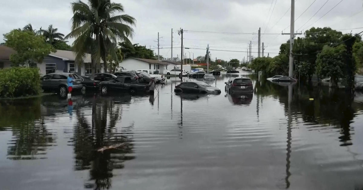 Maps and photos show massive rainfall in Florida as flooded communities face ongoing downpours