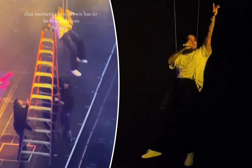 Chris Brown gets stuck dangling in the air during concert, rescued by ladder