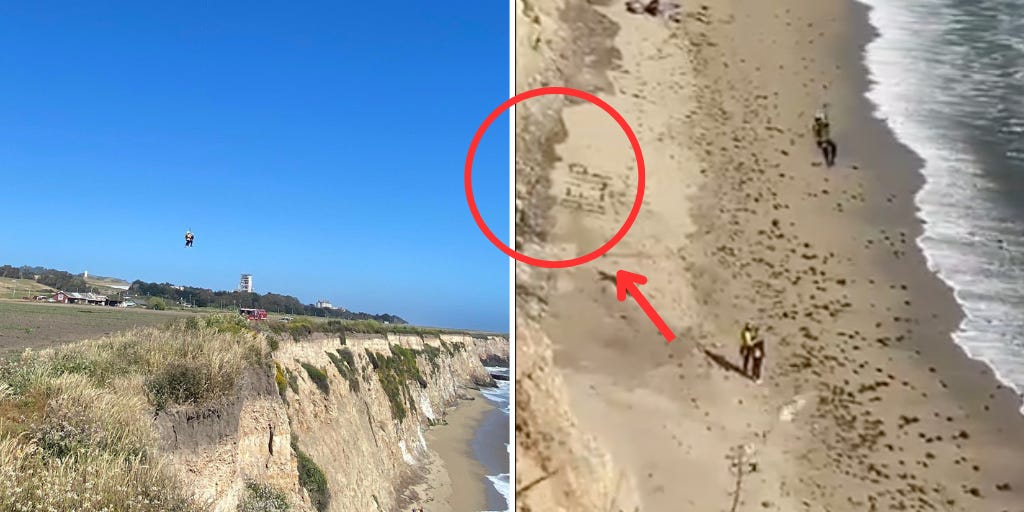 A kite surfer stranded on a remote California beach was rescued after he used rocks to spell 'HELP' on the sand