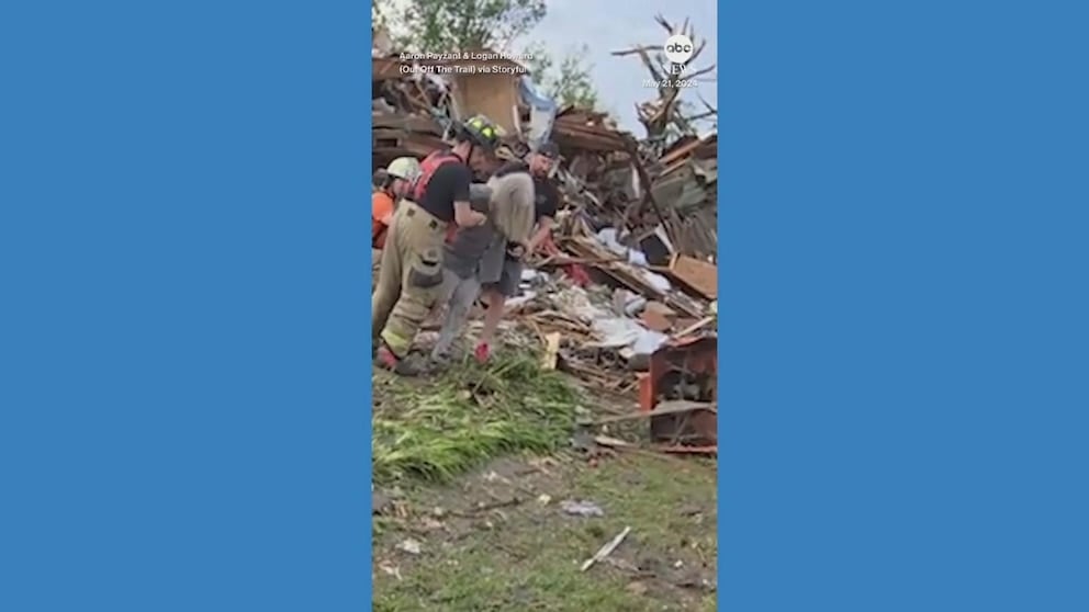 WATCH: Rescue workers pull woman from destroyed home after devastating tornado in Iowa