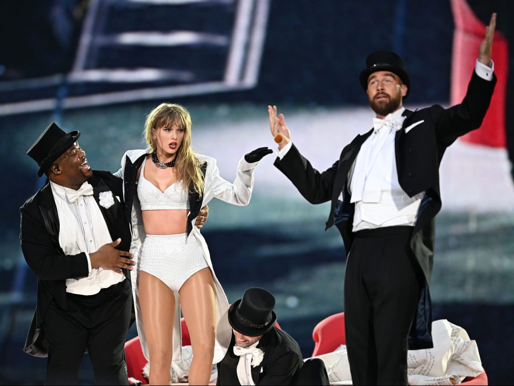 Travis Kelce says he's 'proud' to call Taylor Swift 'my lady,' reveals how she won him over