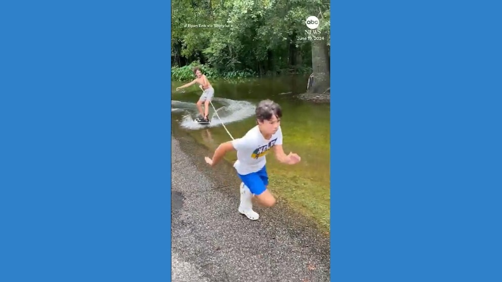 WATCH: No boat required: Kids wakeboard down flooded street in Louisiana