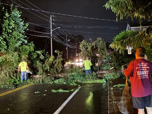 Late-night storms topple trees into homes, dump record rainfall in Mass., Rhode Island