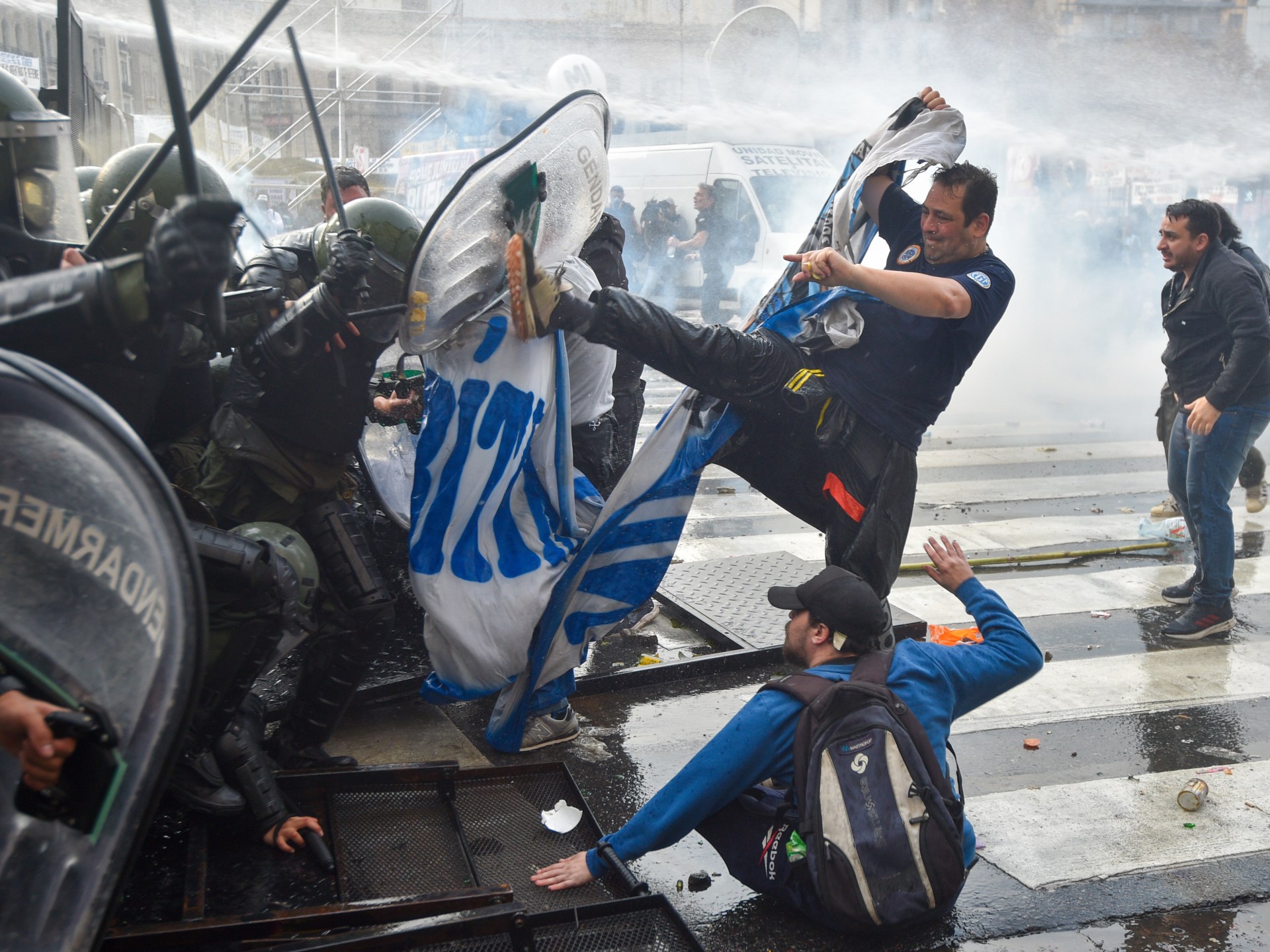 Clashes erupt between police and protesters as Argentina debates reform
