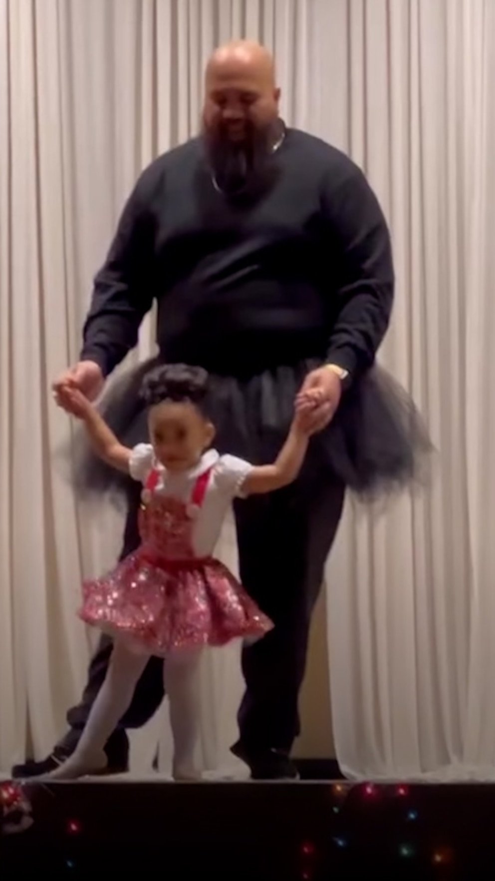 WATCH: 6-foot-5-inch dad wears ballet skirt to dance with daughter for her ballet recital