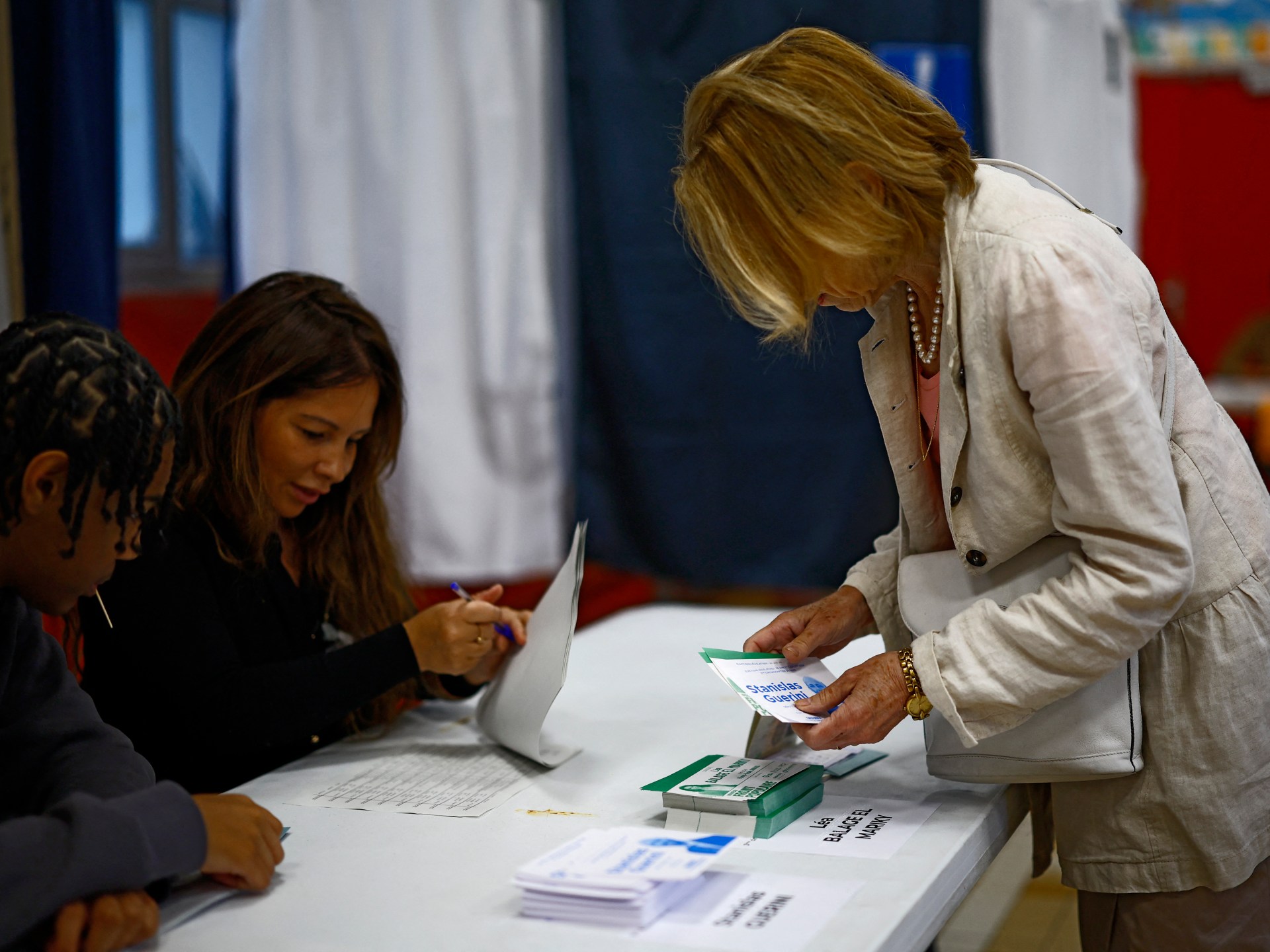 France votes in second round of parliamentary polls as far right eyes power
